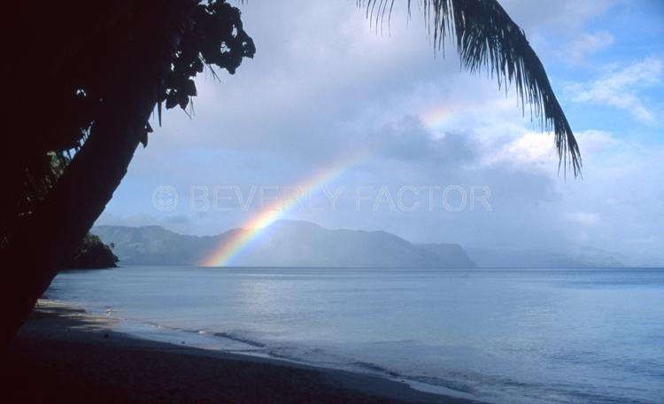Islands;Fiji;sillouettes;rainbow;sky;blue water;trees